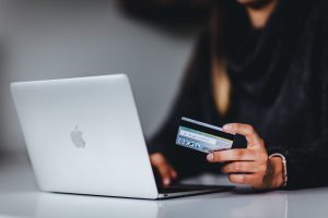 Woman buying online using a credit card
